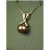 Image 2 : Charming 14K YG Ladies Pendant Set with a center black Pearl averaging 7.50mm in diameter and 4 side
