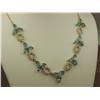 Image 1 : Spectacular 10K YG Ladies Custom Necklace Fine set with 21 pear shape London blue Topaz weighing app