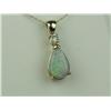 Image 2 : Elegant 14K YG Ladies Custom Pendant Set with a center Australian black Opal weighing approx 2.00 ca