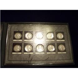 "The First Ten Years of Washington Silver Quarters" Book containing coins from 1932-1942.