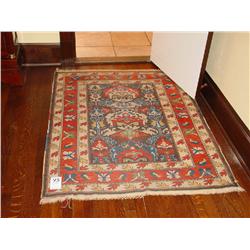 ORIENTAL RECTANGULAR RUG BLUE, PEACH, AND CREAM