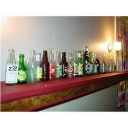 COLLECTION OF GLASS SODA BOTTLES