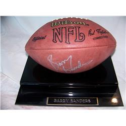 Barry Sanders Hand signed Football W/ COA. Encased in an acrylic protective case.