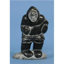 Inuit Sculpture of a Hunter with Seal by Jimmy Inaruli Arnamissak (Jimmy Smith) E7-511  5 1/4" H.  G