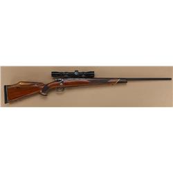 Sporterized Mauser bolt-action rifle, .243  cal., 25” ported muzzle round barrel, blue  finish, cust