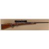Image 1 : Sporterized Mauser bolt-action rifle, .243  cal., 25” ported muzzle round barrel, blue  finish, cust