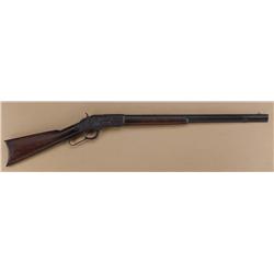 Winchester Model 1873 lever action rifle, .32  WCF cal., 24” octagon barrel, blue finish,  wood stoc