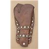Image 2 : Western style double-loop flap holster with  border carving and period nickeled over brass  studs. L
