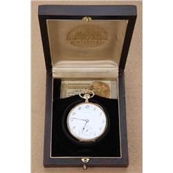 Inscribed 14 kt. Gold Howard pocket watch  contained in a factory Howard rosewood case  in overall e