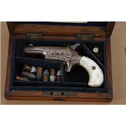Colt #3 .41 caliber rimfire derringer, finely  period scroll engraved in Nimschke style,  silver pla