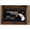 Image 1 : Colt #3 .41 caliber rimfire derringer, finely  period scroll engraved in Nimschke style,  silver pla
