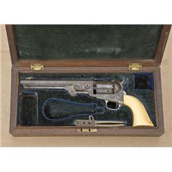 Untouched finely and highly Gustav Young  engraved Colt Model 1851 Navy percussion  revolver in delu