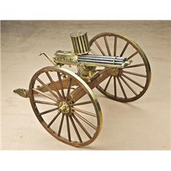 Miniature Gatling gun by Furr of Utah, model  1874, with canister feed. .12 caliber  non-firing, but