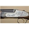 Image 6 : Pair of Perazzi SCO 12ga over/under shotguns,  elaborately high-art engraved in old-west  motifs ins