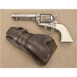 Engraved Colt SAA revolver, .44 CF cal., 5”  barrel, silver finish, ivory grips, #89965.  This gun i