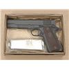 Image 1 : Very interesting Colt Government Model  semi-auto pistol, .45 cal., parkerized  finish, brown checke