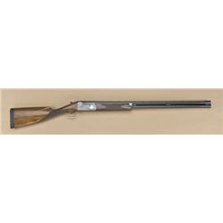 High quality German 12 over/under shotgun,  31-3/8” barrels, with ventilated rib, split  barrels, hi