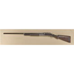 Winchester model 1893 pump-action shotgun,  12ga, 32” barrel, choked “Cylinder”. Blue  finish, stand