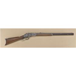 Winchester Model 1873 lever action rifle, .44  WCF cal., 24” octagon barrel, blue finish,  wood stoc