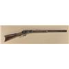 Image 1 : Winchester Model 1873 lever action rifle, .38  WCF cal., 24” octagon barrel, blue finish,  wood stoc