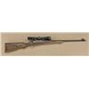 Image 1 : Custom bolt-action rifle on Remington 700  action, 8mm Rem Mag caliber, serial  #A6435977. The rifle