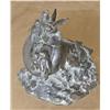 Image 1 : Original bronze casting portraying a  fragmented cannon with birds of peace  entitled “Pax” by E. Do