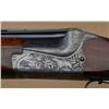 Image 2 : Merkel 12ga over/under shotgun showing 30”  barrels choked “Modified” over “Improved  Cylinder”, sin