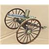 Image 1 : Miniature exposed-barrel Gatling gun with  canister feed on field carriage. .22 long  rifle caliber,