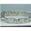 Image 1 : Sensational 14 karat white gold ladies custom  made bracelet weighing over one ounce fine  set with 