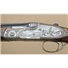 Image 2 : Beretta S09 410ga over/under shotgun showing  28-1/4” barrels, hand-filed raised  low-profile rib, E
