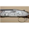 Image 2 : Beretta S09 28ga over/under shotgun showing  English-style straight stock, single trigger,  auto eje