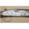 Image 3 : Beretta S09 28ga over/under shotgun showing  English-style straight stock, single trigger,  auto eje