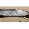 Image 2 : Matched pair of Perazzi extra-grade  over/under shotguns in 12 and 20ga, SCO  sideplates, finely gam