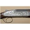 Image 3 : Matched pair of Perazzi extra-grade  over/under shotguns in 12 and 20ga, SCO  sideplates, finely gam