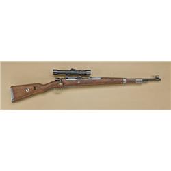 Mauser model 98 sniper rifle, 8mm caliber,  manufactured by J. P. Sauer & Son, showing  long-rail mo