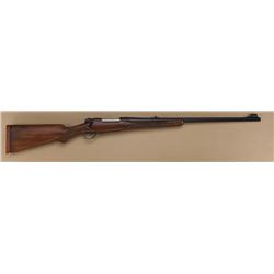 Winchester model 70, .375 H&H magnum, 25”  heavy round barrel, custom stocked, two-leaf  folding rea