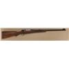 Image 1 : Winchester model 70, .375 H&H magnum, 25”  heavy round barrel, custom stocked, two-leaf  folding rea