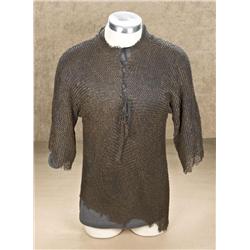 Mideastern chain mail shirt with half  sleeves, good condition. Shows some minor  damage and wear, u
