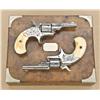 Image 2 : Pair of Colt 1872 old-line .22 caliber 7-shot  opentop revolvers, period or factory  engraved, nicke