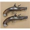 Image 1 : Pair of royal quality French flintlock  pocket-size pistols with ornate silver  mounts, blue and gol