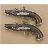 Image 2 : Pair of royal quality French flintlock  pocket-size pistols with ornate silver  mounts, blue and gol