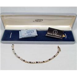 ESTATE JEWELRY - HOUSE OF NIKOLAS STERLING SILVER AND SAPPHIRE BRACELET