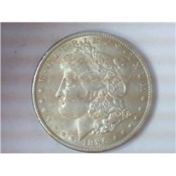 1886-O MORGAN SILVER DOLLAR (AU)