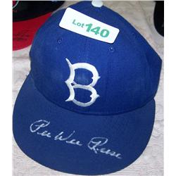 Autographed Baseball Hat by Pee Wee Reese.