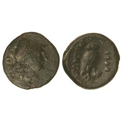 Triens. -  192 a.C. -  VIBO VALENTIA. -  Anv.: Cabeza de Atenea con casco corinto a derecha, detrás