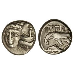 Estátera. -  400-350 a.C. -  ISTROS. TRACIA. -  Anv.: Dos cabezas masculinas, una derecha y otra inv