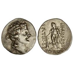 Tetradracma. -  148 a.C. -  THASOS. -  Anv.: Cabeza de Dionisos joven a derecha. Rev.: Heracles con