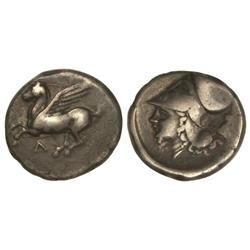 Estátera. -  420-350 a.C. -  LEUKAS. AKARNANIA. -  Anv.: Pegaso volando a izquierda, debajo símbolo.