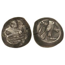 Dishekel. -  s. V a.C. -  FENICIA. -  Anv.: Melkart cabalgando a derecha, debajo olas y delfín. Rev.