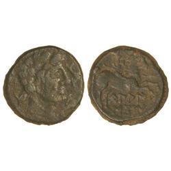 As. -  BELAISCOM. -  Anv.: Cabeza masculina a derecha, delante dos delfines, detrás letra ibérica. R